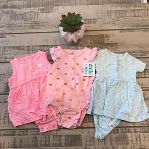 Bundle of 3 baby girl dresses. Snap bottom